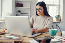 Woman working a laptop computer