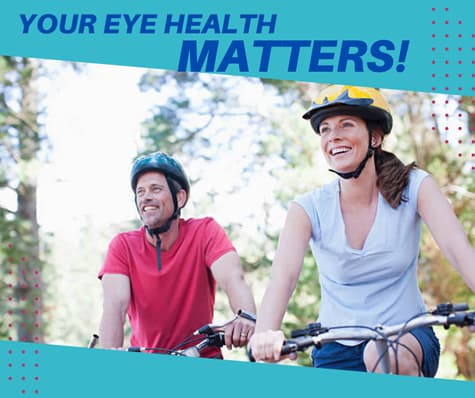 couple smiling while riding their bikes