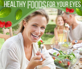 woman smiling eating a salad