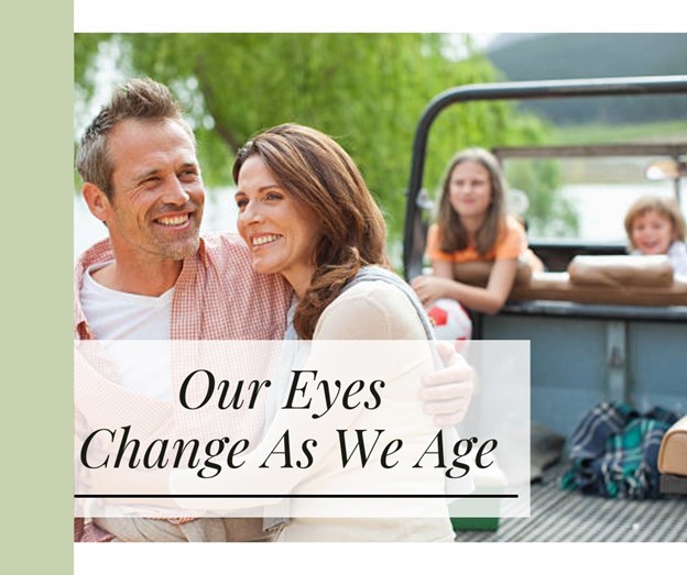 Couple sitting on back of a truck